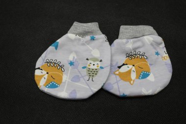 Cute baby socks, serves to keep the baby warm.