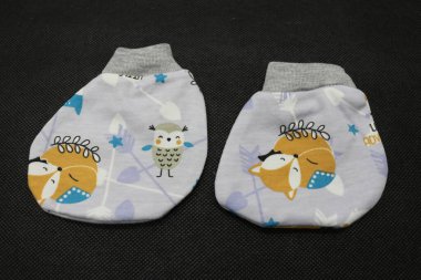 Cute baby socks, serves to keep the baby warm.