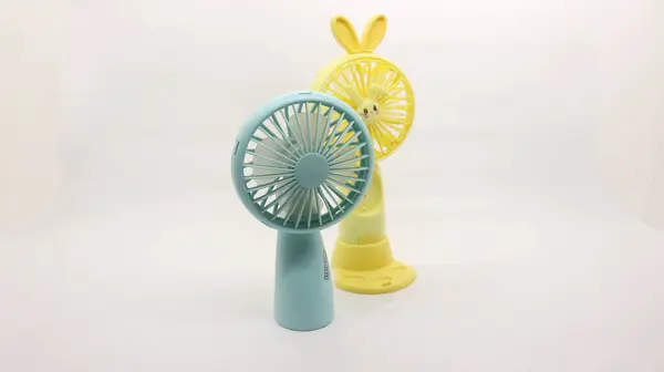 stock image mini portable fan with white background,