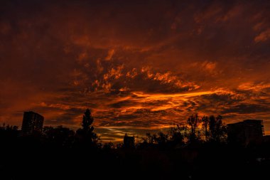 spring sunset storm clouds over the city