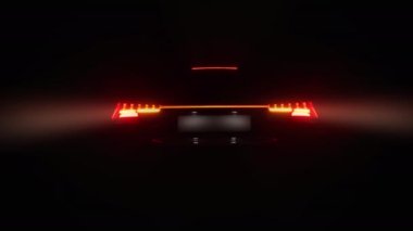 Shots of how the headlights of an electric car light up, the rear lights of the STOP light up and go out. Rear lamp modern car design. footage of black luxury new car parked indoors.