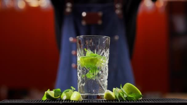 Camera Follows Ice Cubes Falling Glass Fresh Mojito Cocktail Super — Stock Video