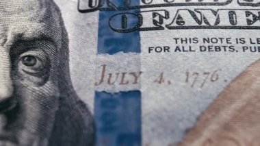 Close up detail of dollars bill. Extreme close up. Macro shot of US banknote. American dollar. Money cash. Financial concept. Numbers and signs on dollar bills. Currency. 4K footage