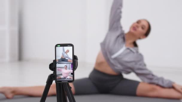Young Fit European Woman Recording Video Blog Sitting Mat Yoga — Vídeos de Stock