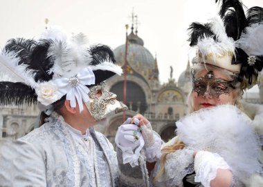 Couple of people dressed up for the Venice Carnival