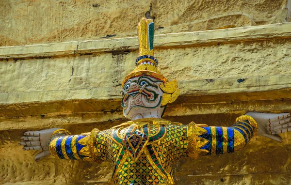 Close up view of a demon guard statue at the Grand Palace in Bangkok, Thailand.