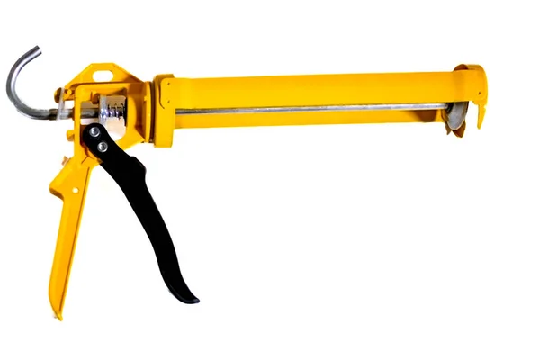 Sarı Yapıştırıcı Silahının Resmi Beyaz Arkaplanda Izole Edildi — Stok fotoğraf