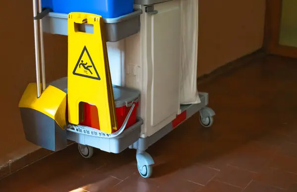 Image of professional cleaning cart with all utensils and safety protocols