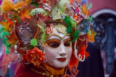 Woman wearing a Carnival mask at Venice.