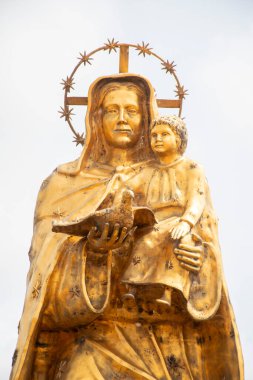 Statue of the Virgin Mary and the baby Jesus clipart