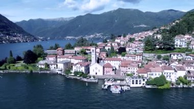 Como Gölü 'ndeki tipik bir İtalyan kasabası olan Torno' nun bahçeleri ve küçük romantik caddeleriyle ilgili sinematik çekimler.