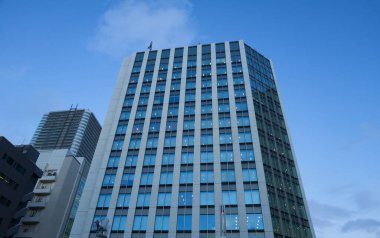 Low angle view of office building exterior in Sapporo Hokkaido, Japan