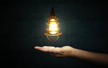 Light Bulbs on dark background. Creative idea concept