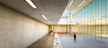 İşadamı, geniş cam duvarlar ve minimalist tasarım içeren gösterişli bir şirket binasından geçiyor. 3B görüntüleme