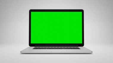Modern dizüstü bilgisayar yeşil krom anahtar ekranı gösteriyor, birleşim için mükemmel. 3d oluşturma