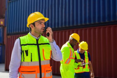 Warehouse engineer worker working at container yard. Logistics and Transportation. High quality photo