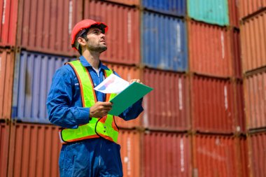 Warehouse engineer worker working at container yard. Logistics and Transportation. High quality photo