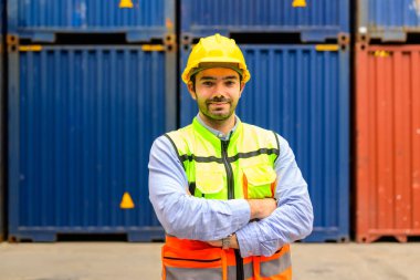 Warehouse engineer worker working at container yard. Logistics and Transportation. High quality photo