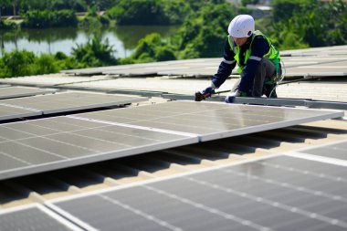 Professional engineer technician with safety helmet checking system. High quality photo