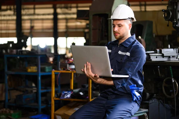 Professional Male Technician Engineer Using Laptop Checking Controlling Machine Manufacturing — 스톡 사진