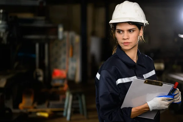 Confident Female Technician Engineer Worker Checking Inspecting Machine Manufacturing Factory — 스톡 사진