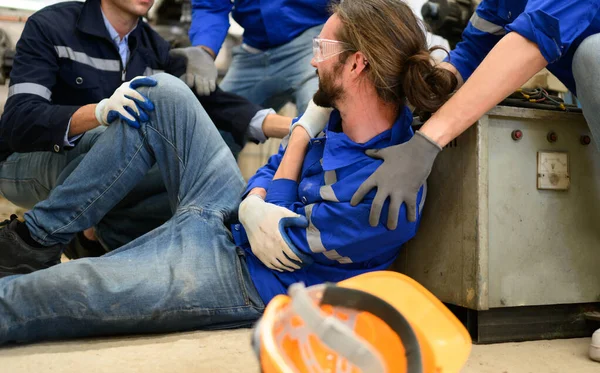 stock image Engineer worker with accident at factory, Worker with injury from machine working