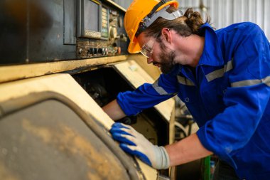 Engineer technician controlling robotic arms on computer laptop, Software mechanic control machine