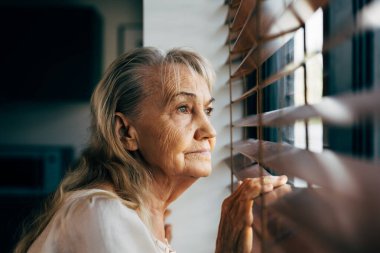 Senior portrait, Grandmother using smart phone at home, Happy retirement people relaxing and resting at home, Healthy and happy senior people concept