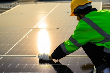 Professional engineer technician with safety helmet checking system. High quality photo