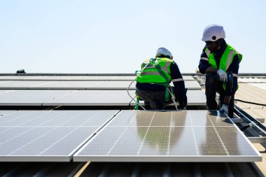 Professional engineer technician with safety helmet checking system. High quality photo