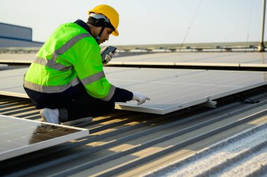 Professional engineer technician with safety helmet checking system. High quality photo