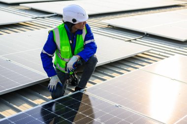 Professional engineer technician with safety helmet checking system. High quality photo