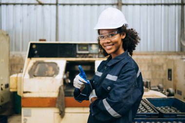 Smiling portrait of confident engineer worker at factory, People with happy working