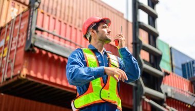 Warehouse engineer worker working at container yard. Logistics and transportation. High quality photo