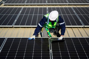 Professional engineer technician with safety helmet checking system. High quality photo