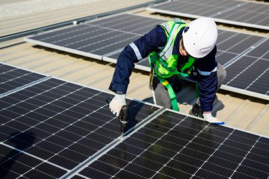 Professional engineer technician with safety helmet checking system. High quality photo