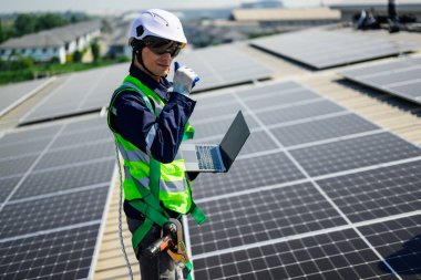 Professional engineer technician with safety helmet checking system. High quality photo