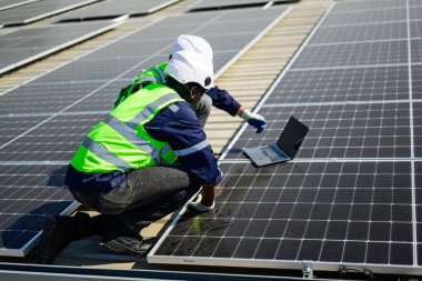 Professional engineer technician with safety helmet checking system. High quality photo