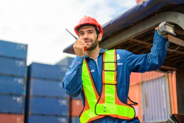 Warehouse engineer worker working at container yard. Logistics and transportation. High quality photo