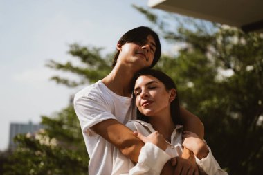 Couple of romantic young people spending time together on weekend at home, Boyfriend and girlfriend portrait, Vintage style photo