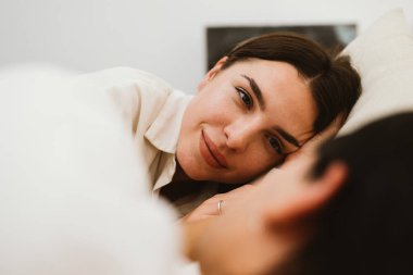 Couple of romantic young people spending time together on weekend at home, Boyfriend and girlfriend portrait, Vintage style photo