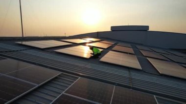 Solar cell farm power plant and solar panels with sunset in evening, Solar energy with warm sky, Clean energy, Alternative energy