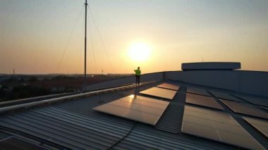 Solar cell farm power plant and solar panels with sunset in evening, Solar energy with warm sky, Clean energy, Alternative energy