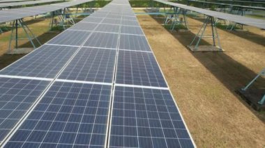 Solar panels in solar power station at solar cell farm, Green energy from sun, Ecology solar power in field, Electrical innovation from nature environment