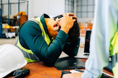 Stressed warehouse worker with hard work, Worker with impression portrait