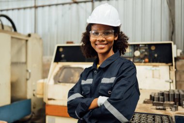 Smiling portrait of confident engineer worker at factory, People with happy working