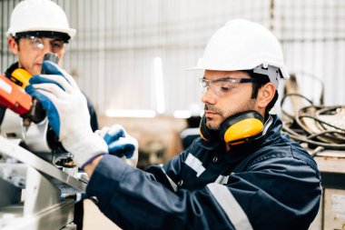 Engineer technician controlling robotic arms on computer laptop, Software mechanic control machine