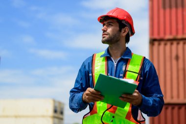 Warehouse engineer worker working at container yard. Logistics and transportation. High quality photo