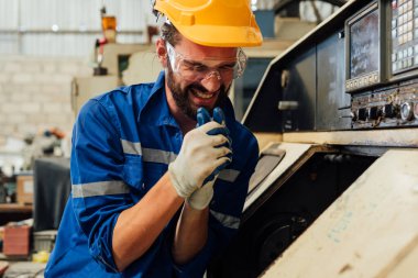 Engineer worker with accident at factory, Worker with injury from machine working