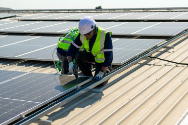 Professional engineer technician with safety helmet checking system. High quality photo